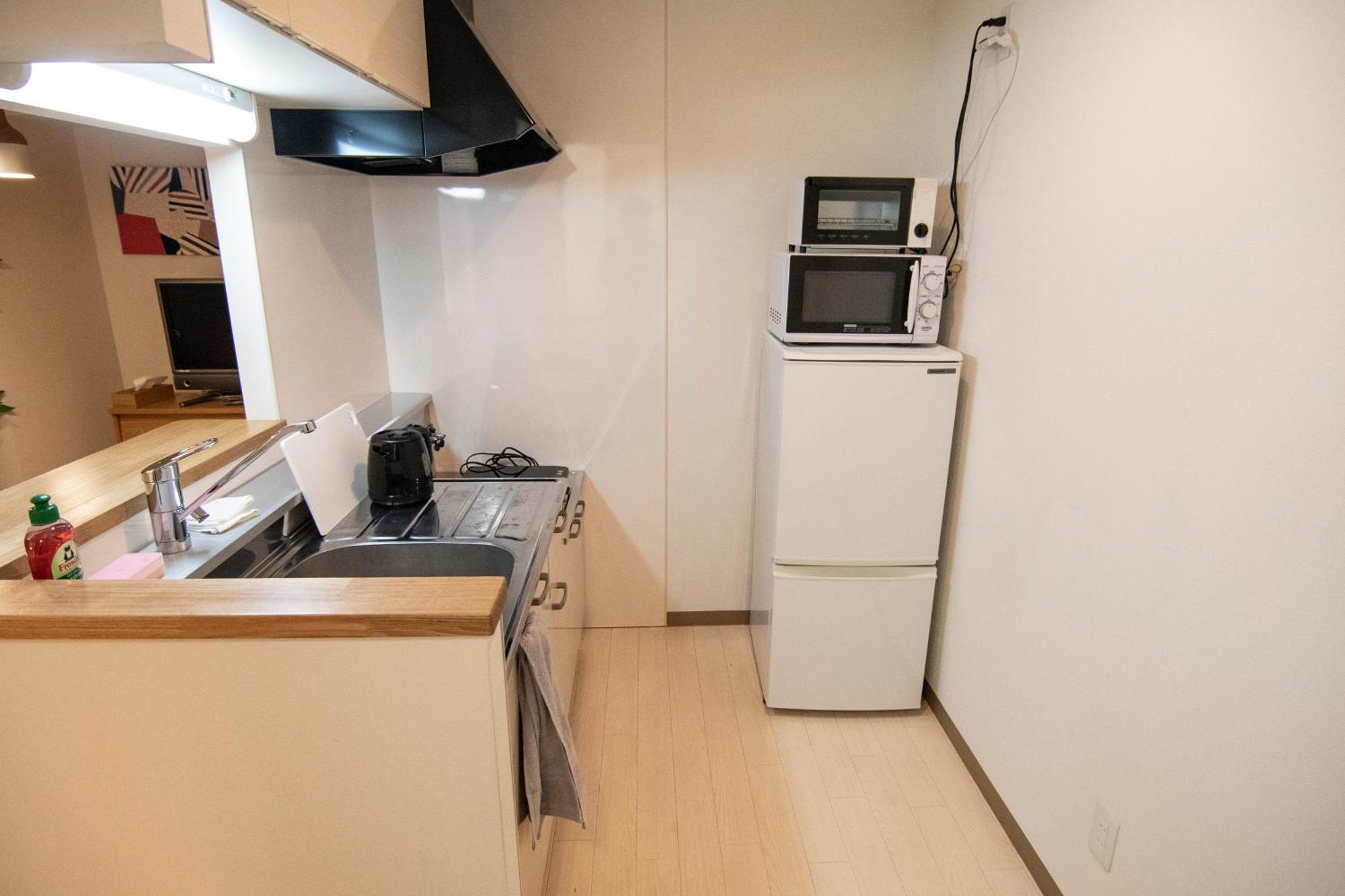 Apartamento Tsubaki Garden Sapporo Habitación foto