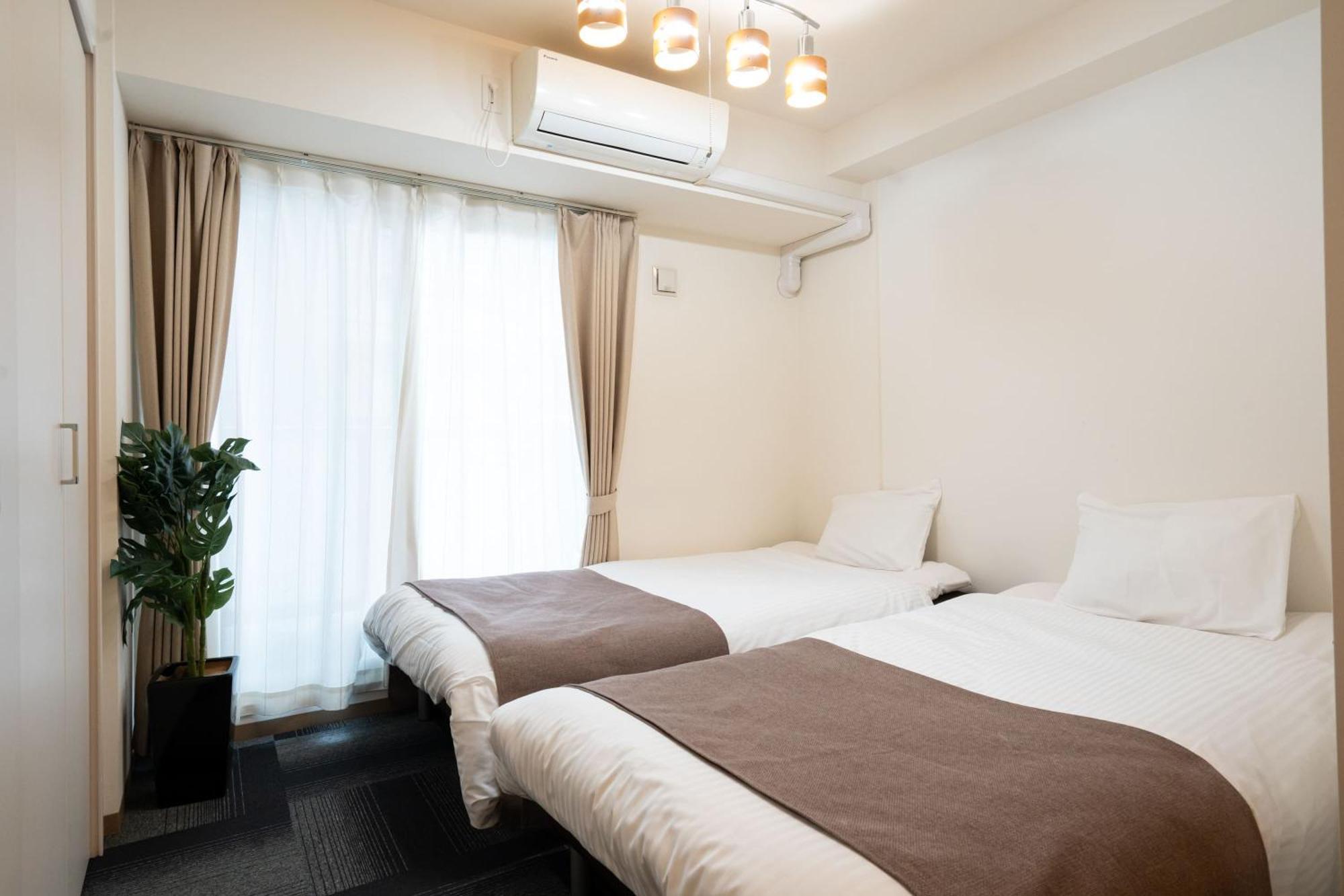 Apartamento Tsubaki Garden Sapporo Habitación foto