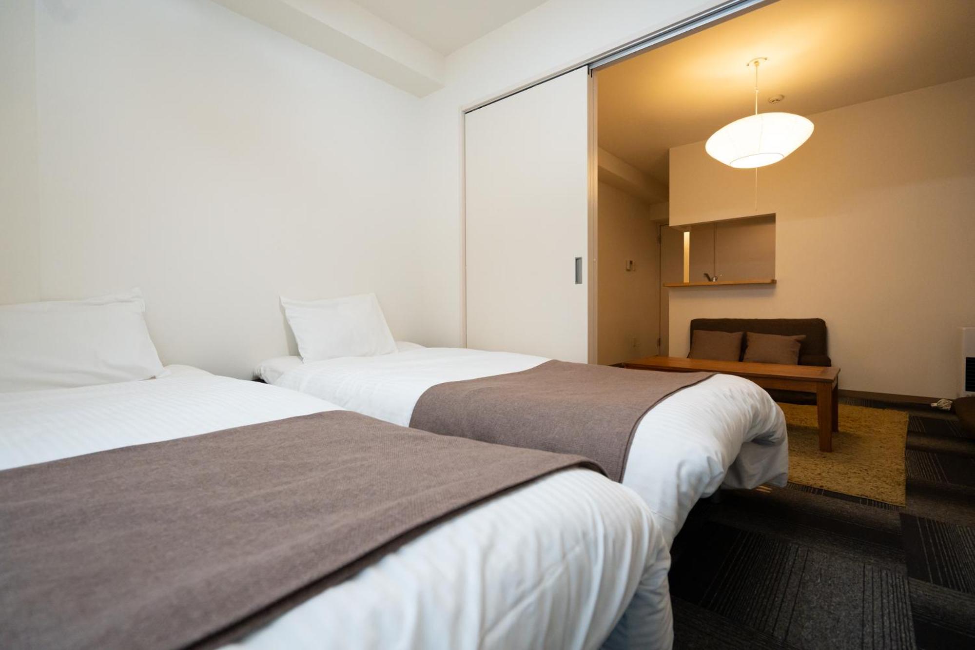 Apartamento Tsubaki Garden Sapporo Habitación foto