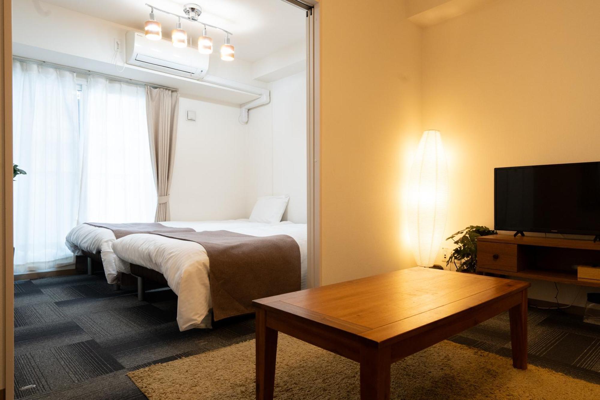 Apartamento Tsubaki Garden Sapporo Habitación foto